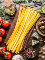Tomatoes, spaghetti pasta and spices.