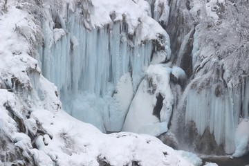 Plitvice Lakes National Park in Croatia. Winter scene with frozen waterfalls.