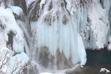 Winter scene of the frozen Plitvice lakes, National park in Croatia