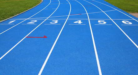 lanes of a athletic track with numbers one two three four five s