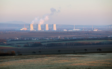 Obraz premium Countryside rural landscape with nuclear power plant