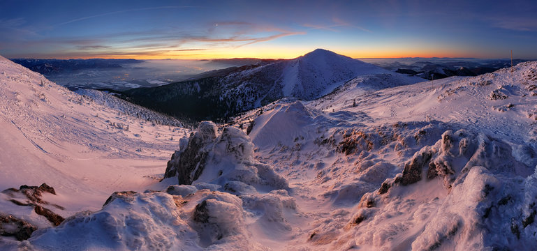 Colorful winter night in mountains, panorama in Slovakia.