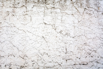 Obraz premium Old aged and weathered white marble like texture on exterior outdoors. 