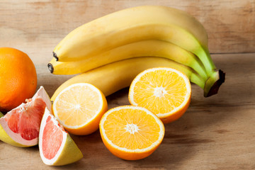 Ripe fresh fruits on wood desk
