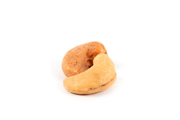 Roasted cashews isolated on white