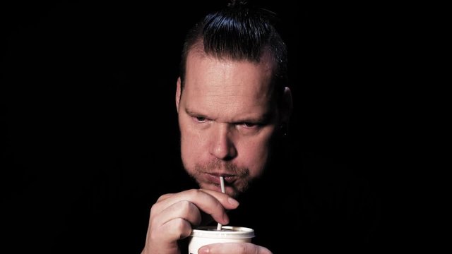 Man drinking soda