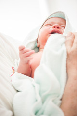 Newborn baby first bath