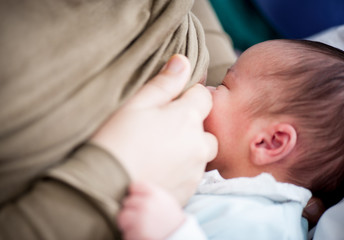 Newborn baby feeding milk