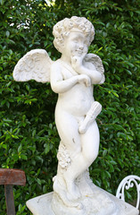 Cupid sculpture in the garden