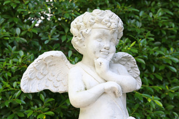 Cupid sculpture in the garden