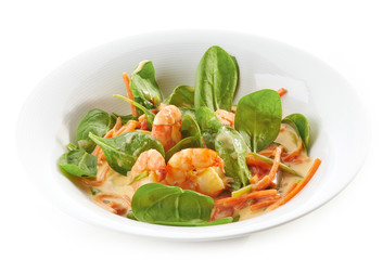 fried prawns and vegetables with coconut sauce