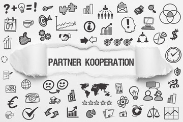 Partner Kooperation / weißes Papier mit Symbole
