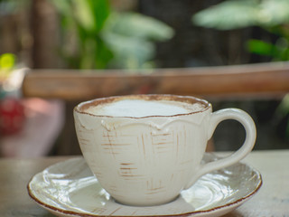 Coffee cup on a wooden table.