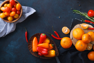 Fruits, vegetables and herbs on blue background