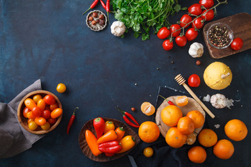 Fruits, vegetables and herbs on blue background