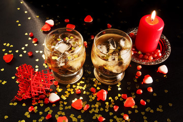 Two glasses with alcohol and ice