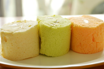 assorted cake roll arranged on plate