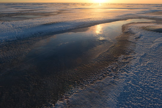 Ice desert at sunset winter sun natural beauty
