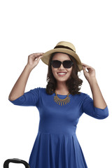 Young asian girl posing with vintage clothes hat and sunglasses