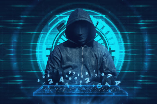 Hooded man with mask typing on keyboard virtual
