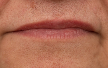 Fototapeta premium Women's thin lips wrinkles