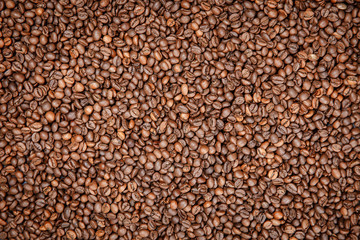 Roasted coffee beans, can be used as a background.
