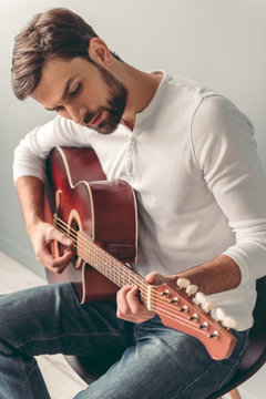 Handsome man with guitar