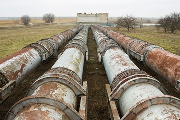 The pipes of the old factory. Steal big pipeline. Stock image.