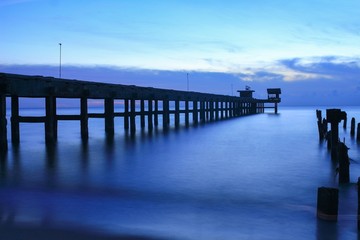 Fototapeta na wymiar sunset landscape twilight time beautiful at bridge harbor and sea