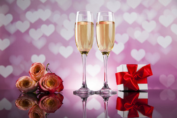Champagne with Valentines day background and roses, mirror backg
