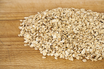 Oatmeal on wooden board