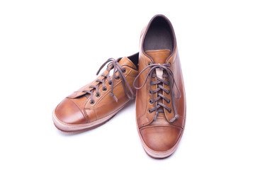 man leather brown shoes on white background.