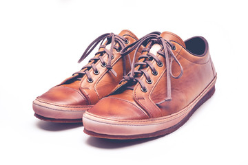 man leather brown shoes on white background.