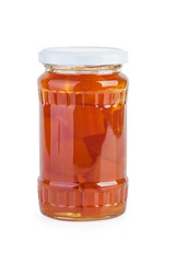 Glass jar with preserved pumpkin pieces