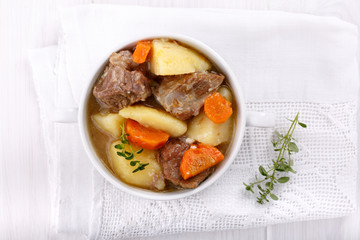 Meat stew with potatoes and carrots.