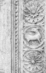 Fototapeta na wymiar (Assisi, Umbria, Italy)- Stone carved decorations in Saint Francis of Assisi basilica, neo-gothic style. (black and white).