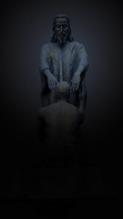 Fototapeta na wymiar Christian saint statue on black background , Jesus on black back