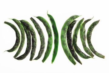 Backlit of french green beans on white, abstract textured background