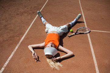 Young girl playing in tennis.