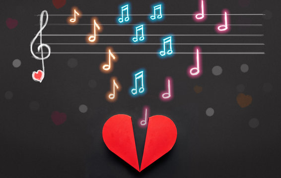 Music notes and note scale above red heart box, Valentines Day c