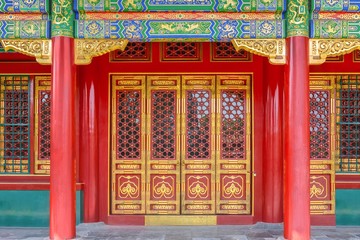 Gateway with red Chinese doors