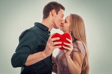 Flirting couple in love kissing