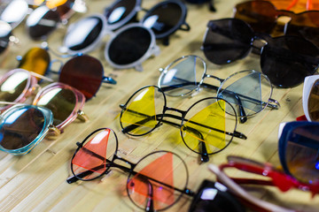 Fashion Sunglasses in shop. Unusual and original Collection of sunglasses. Instagram Filter.