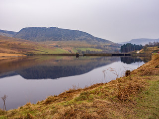 Dove stones reservoir on a cloudy winters January day. Oldham, Saddleworth, UK