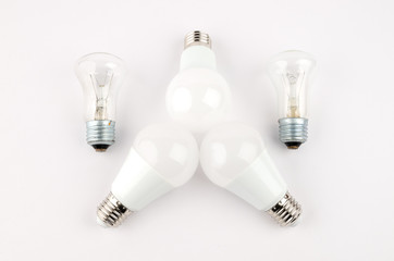 several LED energy saving light bulbs over the old incandescent, use of economical and environmentally friendly light bulb concept