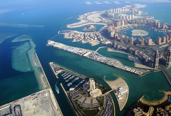 Rolgordijnen Aerial view of the The Pearl Qatar, a new neighborhood in Doha built on an artificial island  © eqroy