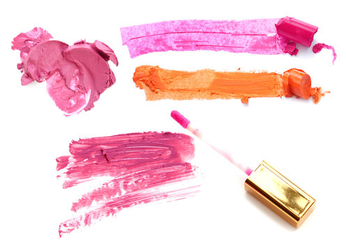 Collection of various lipstick on white background