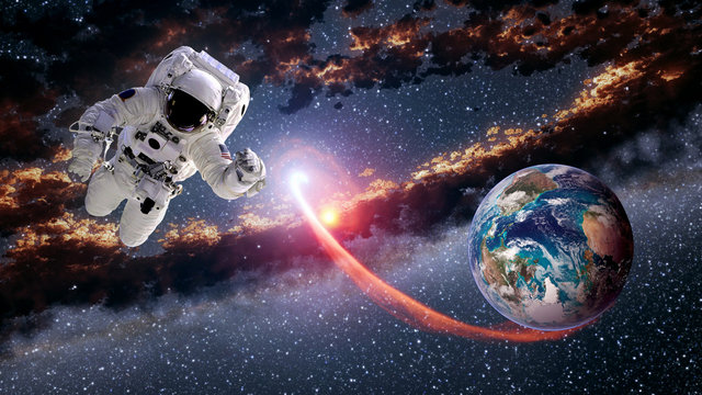 Astronaut planet Earth spaceman launch outer space suit galaxy universe. Elements of this image furnished by NASA.