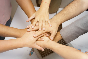 Team Work Concept : Group of Diverse Hands Together Cross Proces