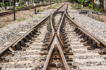 Obraz premium The track on a railway or railroad is the structure consisting of the rails, fasteners, railroad ties and ballast, plus the underlying subgrade.